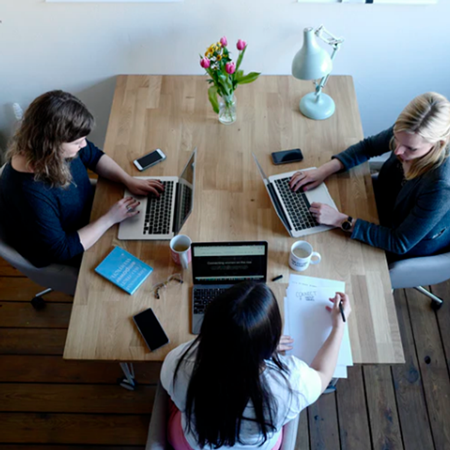Photo of someone taking minutes of meeting